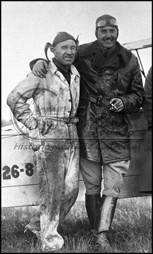Pilot & His Mechanic Standing by their Plane