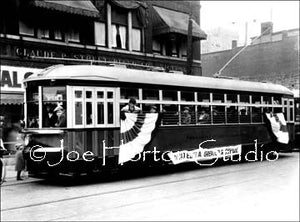 Electric Streetcar In Front Of Claude P. Street